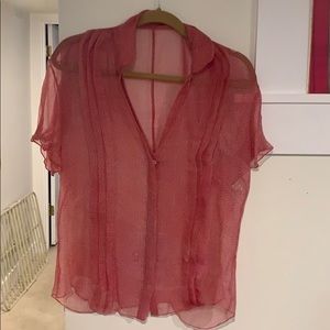 Megan Park beautiful red and whit blouse.